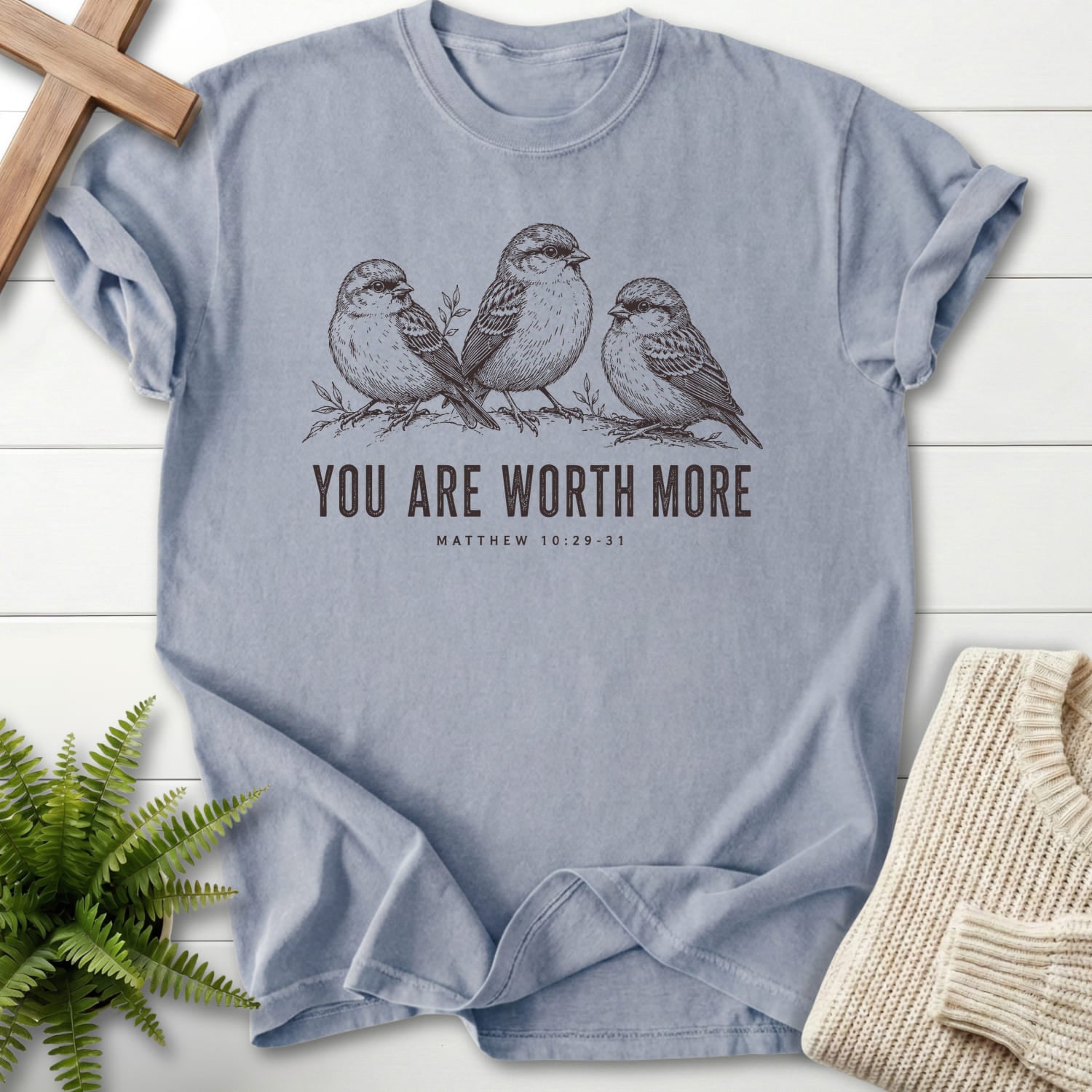 Flat lay of a Granite Christian graphic tee featuring "You Are Worth More Sparrows T-Shirt" design.