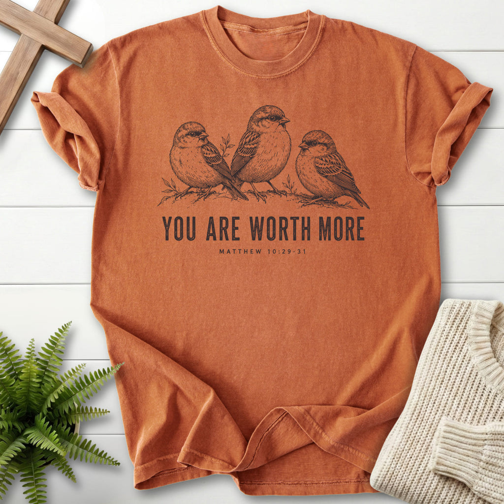 Flat lay of a Yam Christian shirt featuring "You Are Worth More Sparrows T-Shirt" design.