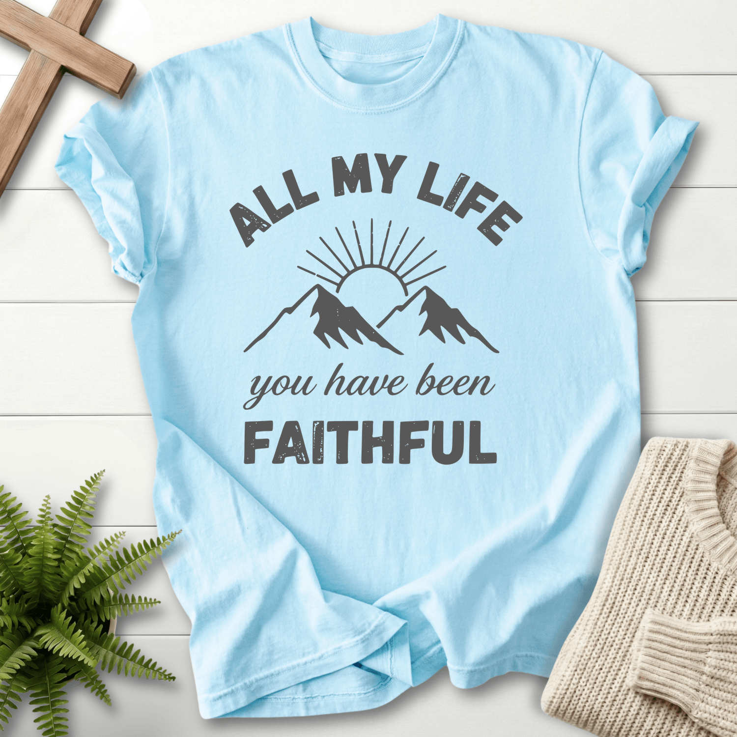 Chambray Christian t-shirt for women with a sun mountain graphic and You Have Been Faithful text.