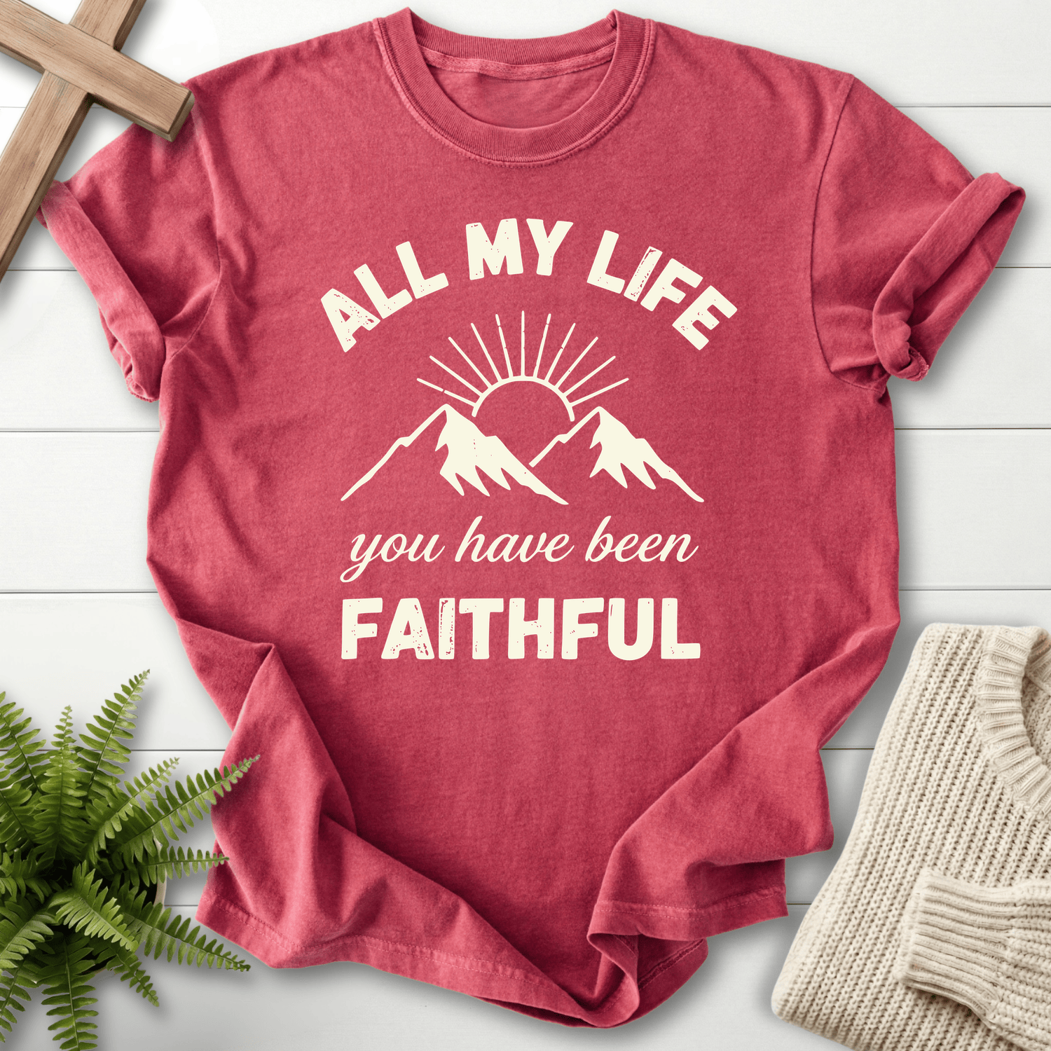 Crimson Christian t-shirt for women with a radiant sun and mountains and You Have Been Faithful text.