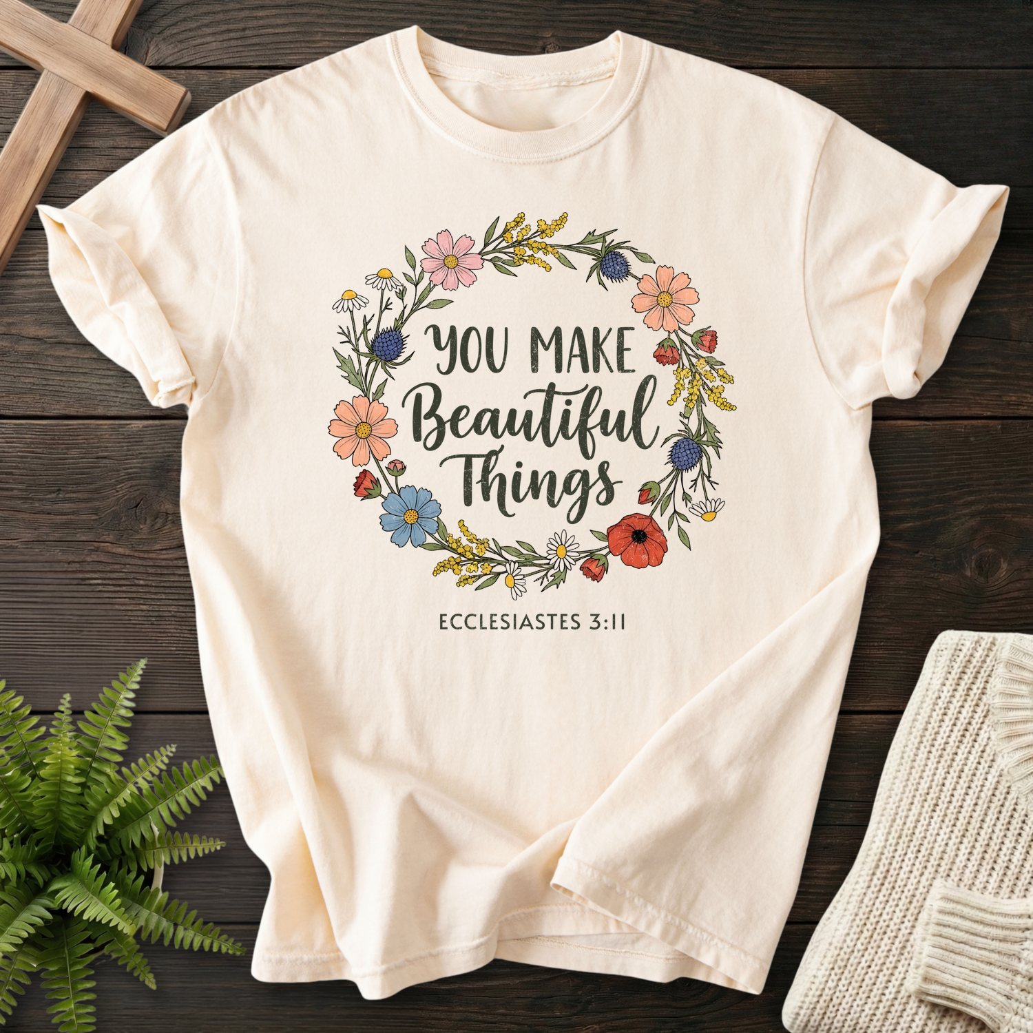 Ivory Christian t-shirt for women with a wildflower wreath and You Make Beautiful Things text, inspired by Ecclesiastes 3:11.